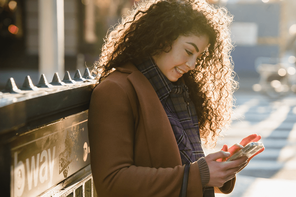 woman texting on phone