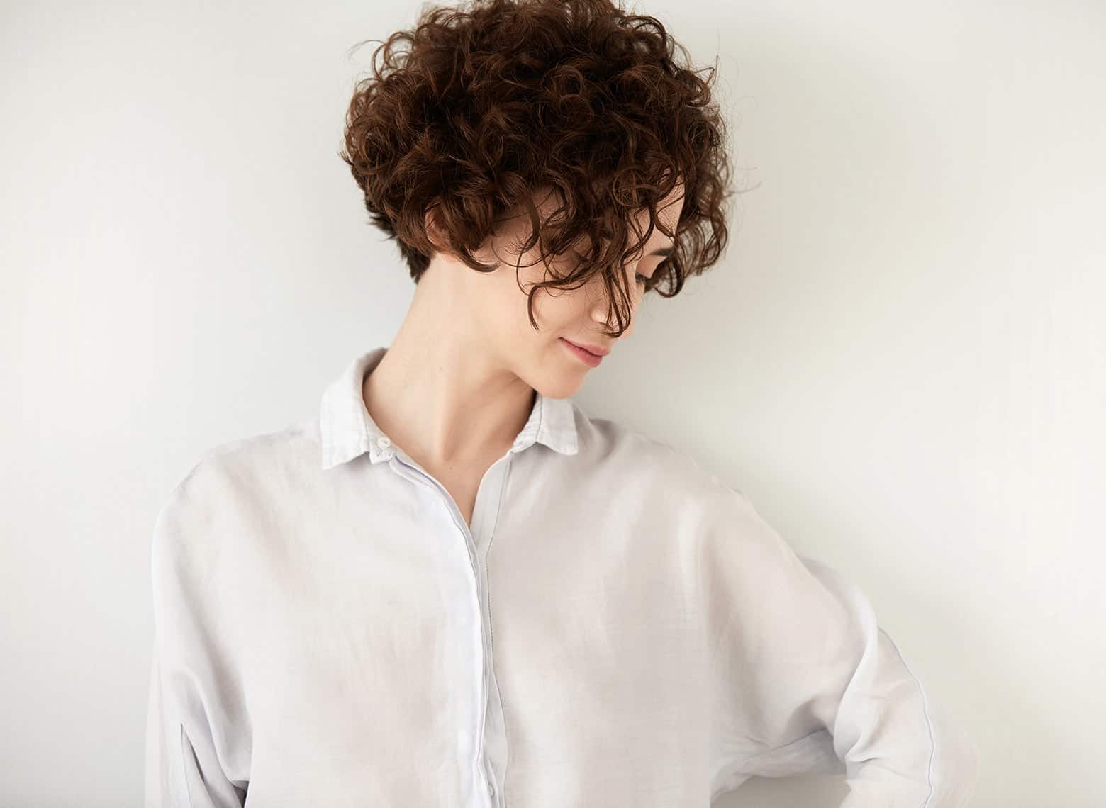 woman with short and curly hair