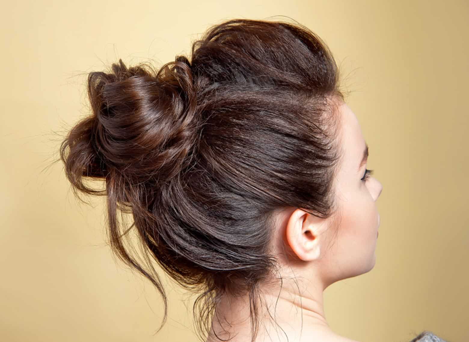 woman with a messy bun